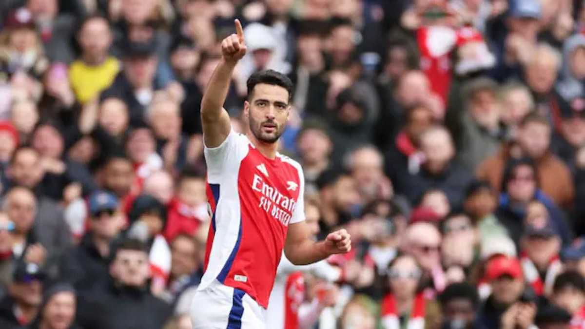 Arsenal's Mikel Merino celebrates after scoring his side's opening goal during the English Premier League soccer match between Arsenal and Chelsea at Emirates stadium in London